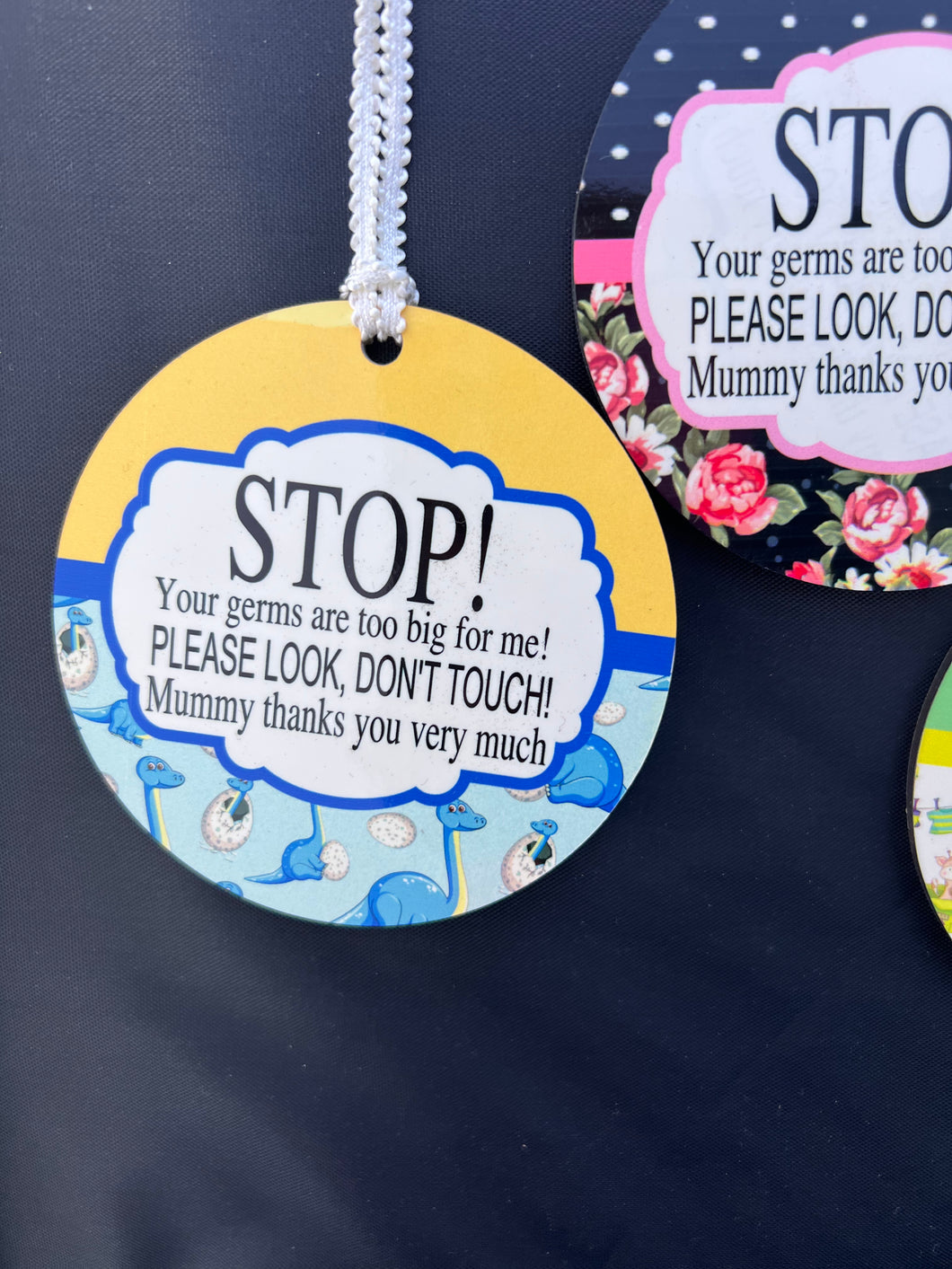 Car seat/ stroller do not touch  baby germ sign tag